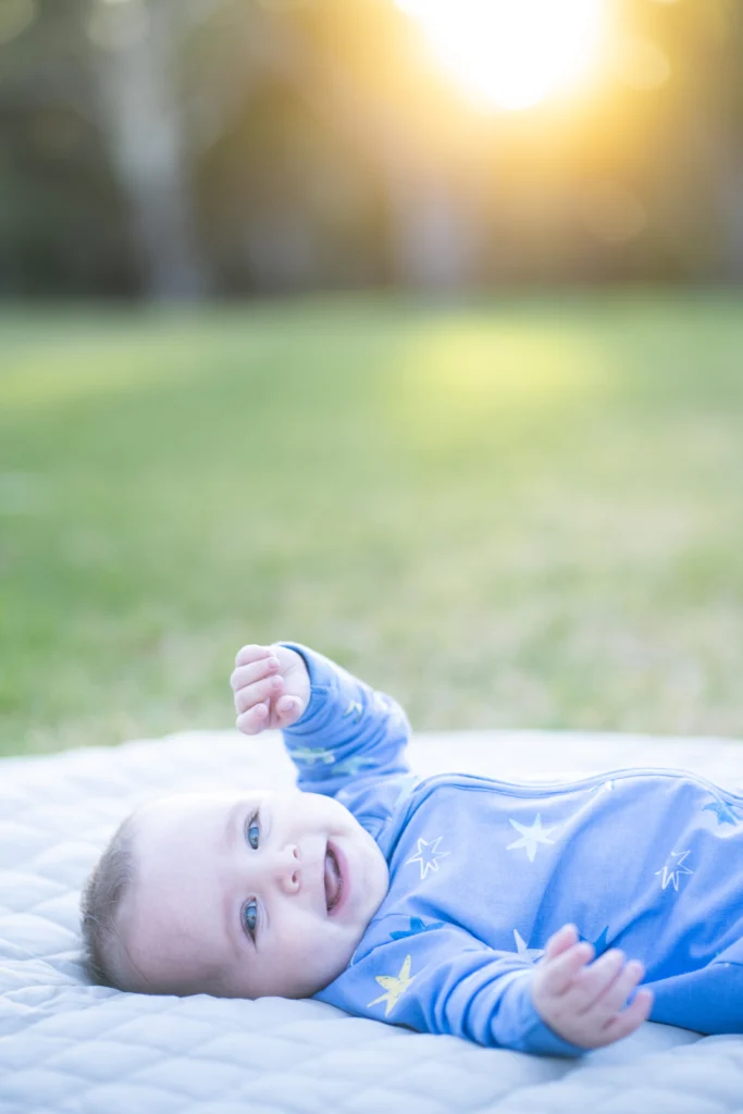 Photo of a baby at a family sunrise photo session